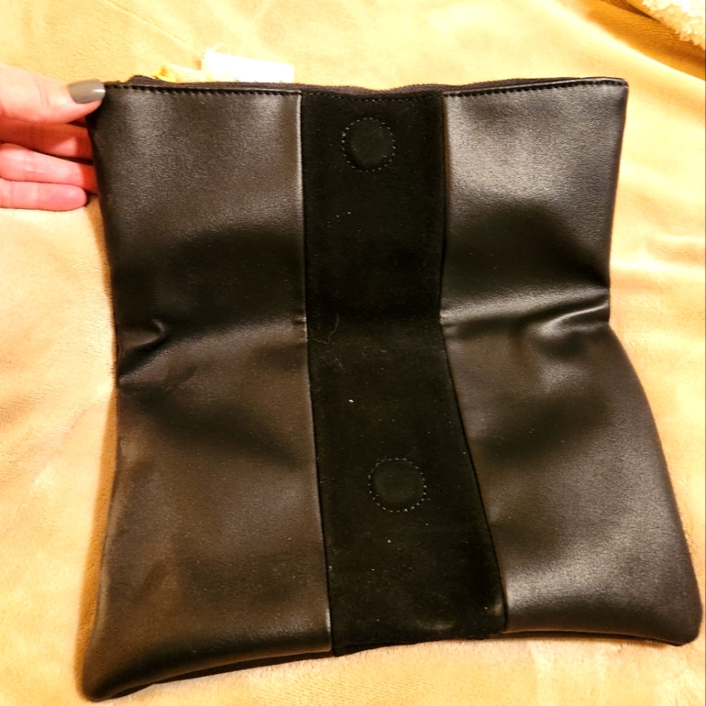 Black clutch, new with tags, gold zipper.
